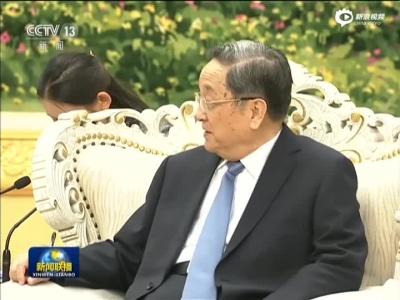俞正声会见老挝人革党代表团