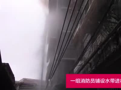 广州荔湾一住宅楼失火女童被困 现场清理出大量现金
