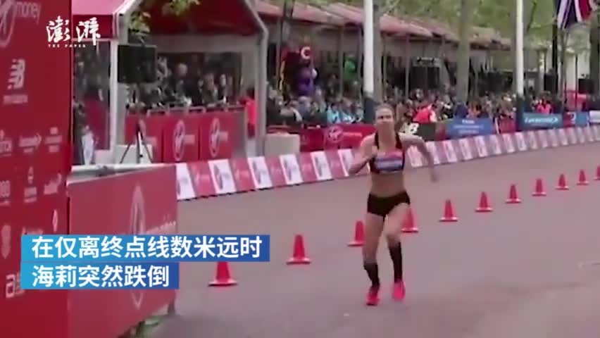 视频-离终点数米摔倒 英国女子爬完马拉松
