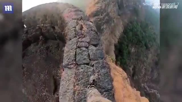 视频-吓出冷汗！冒险者千米城墙上徒步拍摄