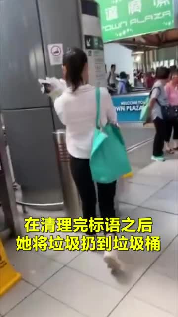 视频-香港女孩霸气撕掉港独标语 潇洒挥手而去