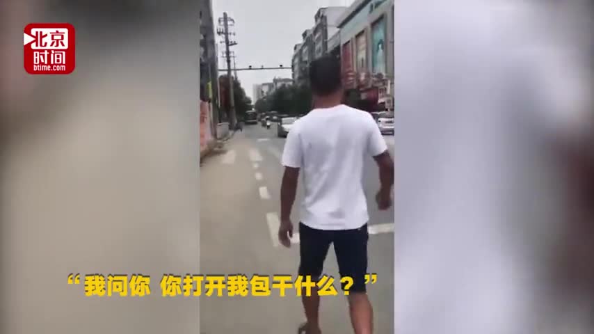 视频-女孩追拍斥责小偷 男子“百米冲刺”逃离现场