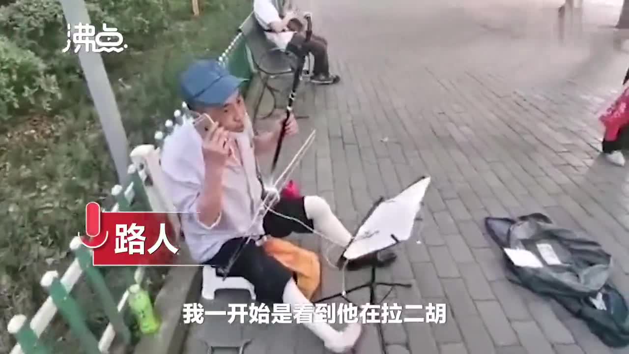 残疾人街头拉二胡遭城管驱逐 外国人看到会影响形象 城管 新浪新闻